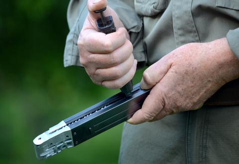 Umarex BB Speed Loader being used on a Legends MP40 BB magazine